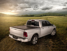 Load image into Gallery viewer, Roll-N-Lock 07-13 Chevy Silverado/Sierra 1500 w/OE Rail Caps LB 96-1/4in M-Series Tonneau Cover