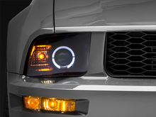 Load image into Gallery viewer, Raxiom 05-09 Ford Mustang Halogen 2010 Style LED Halo Headlights-Blk Hsng(Clear Lens/Excludes GT500)