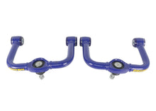 Load image into Gallery viewer, Superpro 05-21 Nissan Frontier - Fixed Offset Upper Control Arm Set - Camber/Caster Correction