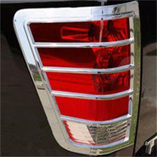 Load image into Gallery viewer, Putco 05-06 Nissan Armada Tail Light Covers