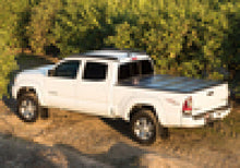 Load image into Gallery viewer, BAK 07-15 Nissan Titan 7ft 1in Bed BAKFlip G2