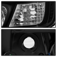 Load image into Gallery viewer, Spyder 04-15 Nissan Titan High-Power LED Module Equipped Headlights - Black (PRO-YD-NTI04PL-BK)