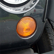 Load image into Gallery viewer, Omix Park Lamp Left Amber 07-13 Jeep Wrangler