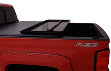 Load image into Gallery viewer, Lund 07-13 Toyota Tundra Fleetside (8ft. Bed) Hard Fold Tonneau Cover - Black