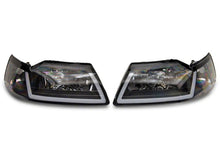 Load image into Gallery viewer, Raxiom 99-04 Ford Mustang Axial Series Headlights w/ Sequential LED Bar- Blk Housing (Clear Lens)