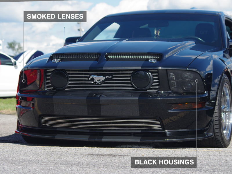 Raxiom 05-09 Ford Mustang w/ Halogen LED Halo Prjctr Headlights-Blk Hsng(Smoked Lens Exclude GT500)