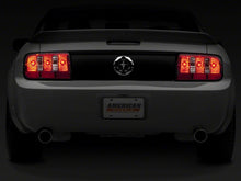 Load image into Gallery viewer, Raxiom 05-09 Ford Mustang Coyote Tail Lights- Chrome Housing - Red/Clear Lens