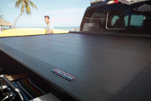 Load image into Gallery viewer, Roll-N-Lock 07-17 Toyota Tundra Crew Max Cab 65in E-Series Retractable Tonneau Cover