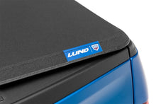 Load image into Gallery viewer, Lund 15-18 Ford F-150 (5.5ft. Bed) Genesis Elite Tri-Fold Tonneau Cover - Black