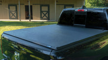 Load image into Gallery viewer, Lund 19-23 RAM 1500 (5.5ft Bed w/o RamBox Cargo Mgmt) Genesis Tri-Fold Tonneau Cover - Black