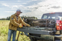 Load image into Gallery viewer, Roll-N-Lock 99-07 Ford F-250/F-350 Super Duty SB 80-3/4in Cargo Manager