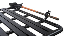 Load image into Gallery viewer, Rhino-Rack Multi-Purpose Shovel &amp; Conduit Holder Bracket for 5 Series Pioneer Racks