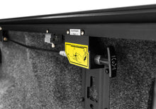 Load image into Gallery viewer, Roll-N-Lock 15-17 Ford F-150 77-3/8in E-Series Retractable Tonneau Cover