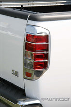 Load image into Gallery viewer, Putco 05-06 Nissan Frontier Tail Light Covers