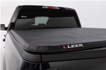 Load image into Gallery viewer, LEER 2019+ Dodge Ram LATITUDE New Style 5Ft7In Tonneau Cover - Folding Full Size Short Bed