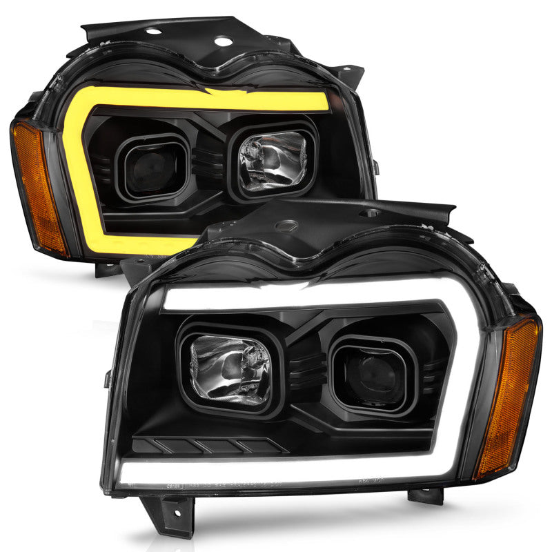 ANZO 2005-2007 Jeep Grand Cherokee Projector Headlights w/ Light Bar Switchback Black Housing