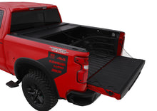 Load image into Gallery viewer, Roll-N-Lock 10-17 Dodge Ram 1500/2500/3500 SB 76in A-Series Retractable Tonneau Cover