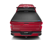 Load image into Gallery viewer, Lund 19-23 Chevrolet Silverado 1500 (5.5ft. Bed) Genesis Tri-Fold Tonneau Cover - Black