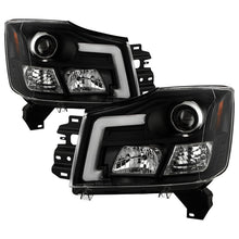 Load image into Gallery viewer, Spyder 04-15 Nissan Titan High-Power LED Module Equipped Headlights - Black (PRO-YD-NTI04PL-BK)